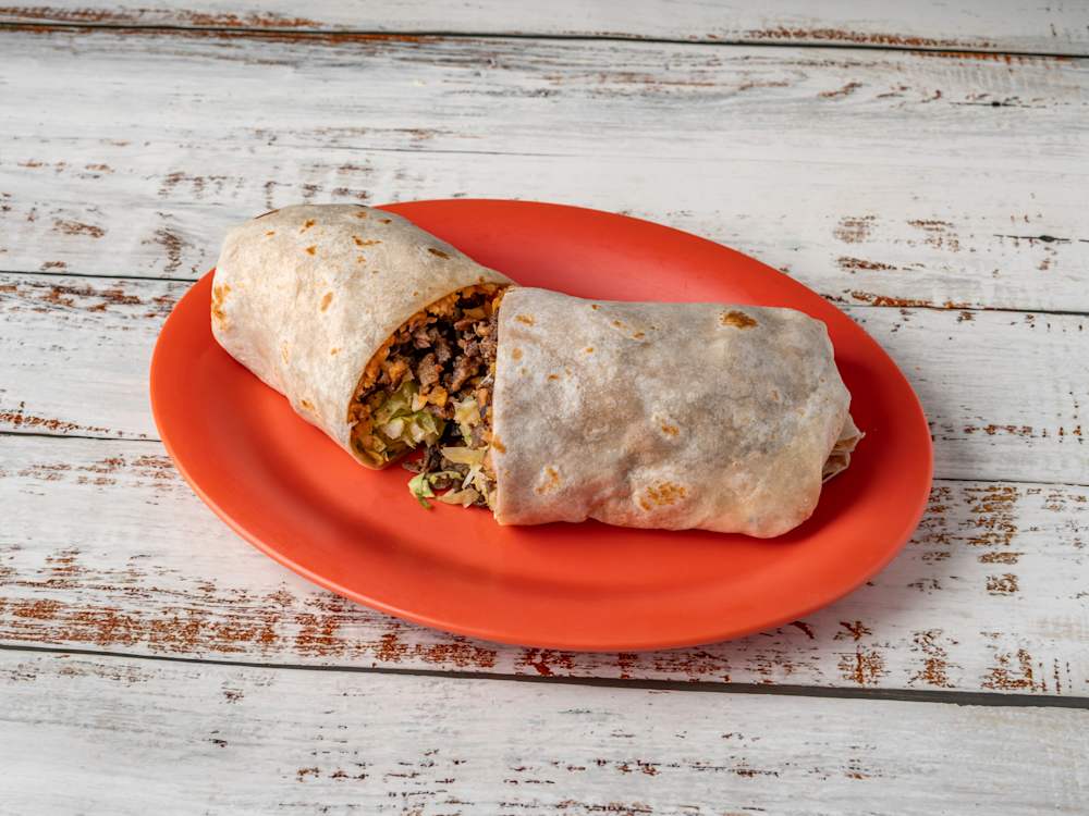 El Faro burrito filled with beans, rice, cheese and your choice of meat
